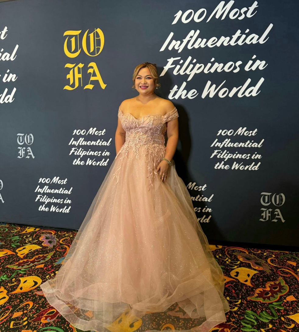 Christallyne on the TOFA Awards red carpet step-and-repeat